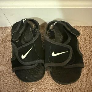 Nike Kids Black Sandals with White Swoosh
